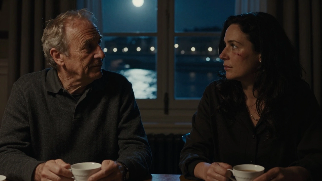 A man and woman sitting in silent understanding, moonlight on the Seine behind them.